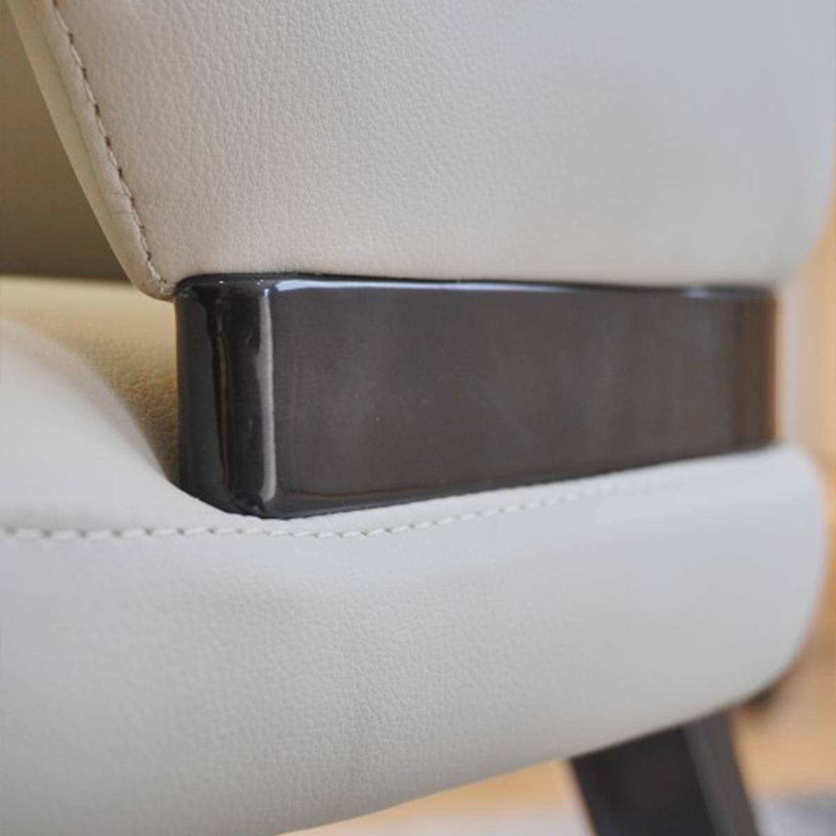 Close-up detail of the metal accent strip on the chair