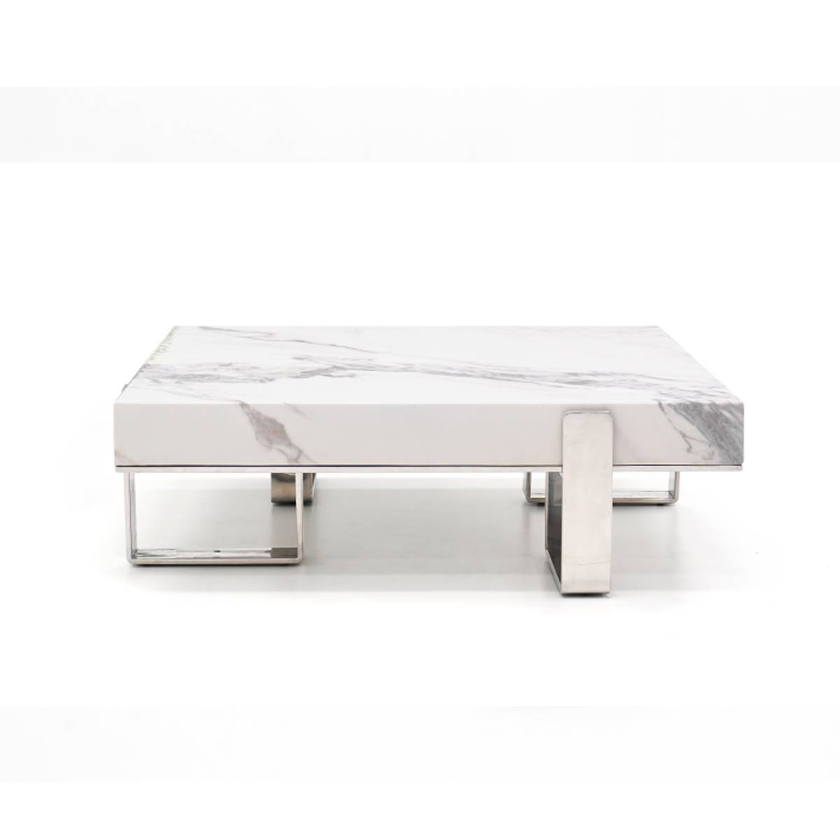 Side view of white marble coffee table showing stainless steel base