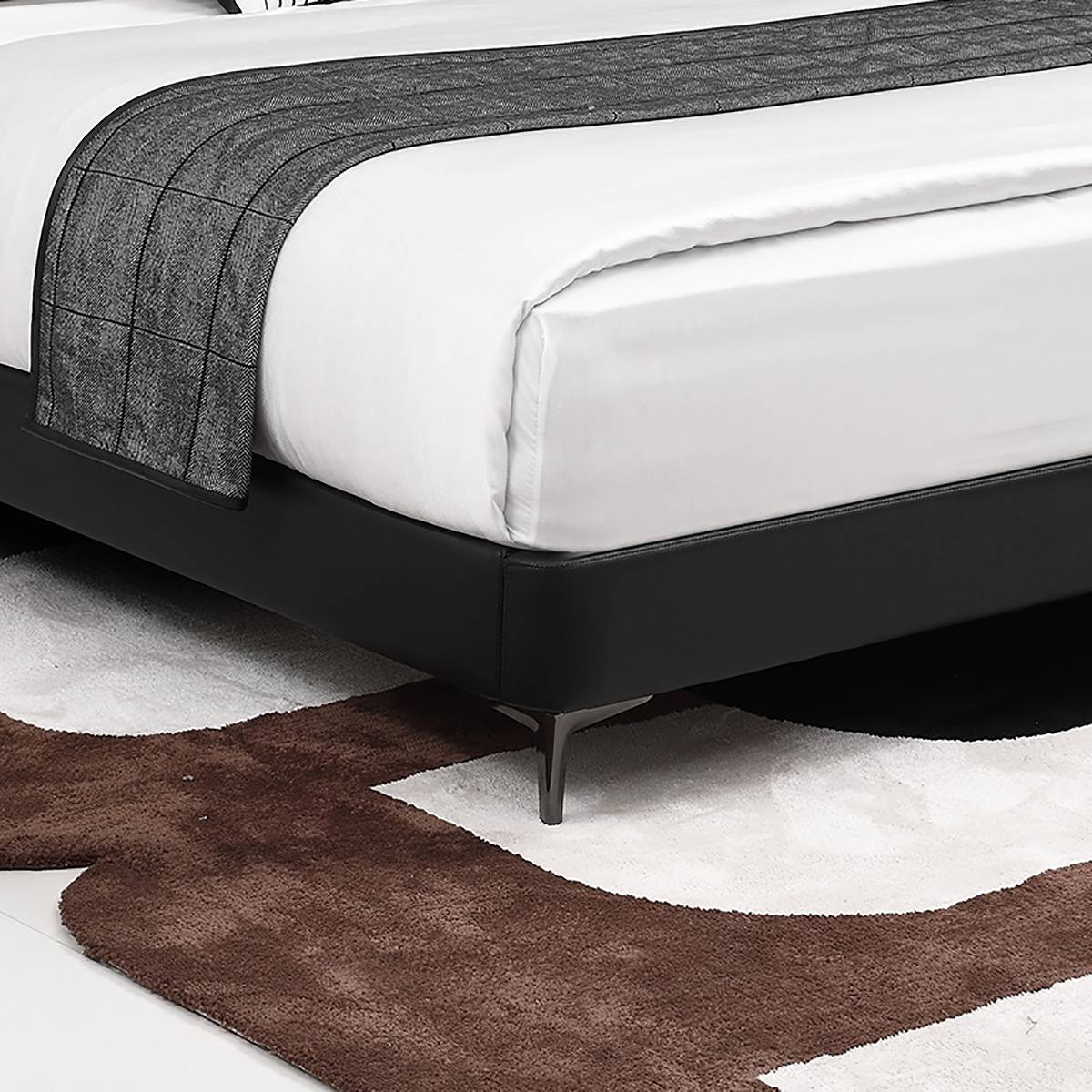 Close-up of the bed frame base and metal legs