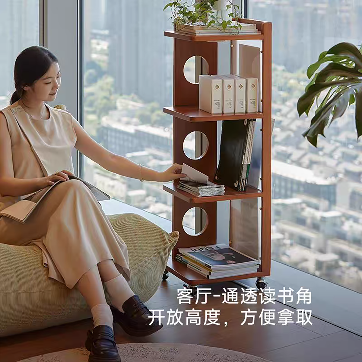 Woman reading next to the side cabinet in a living room