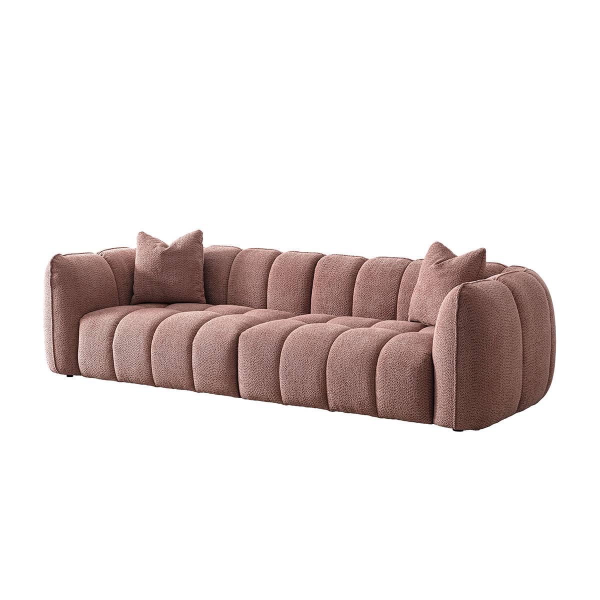 Side view of the pink pumpkin sofa on white background