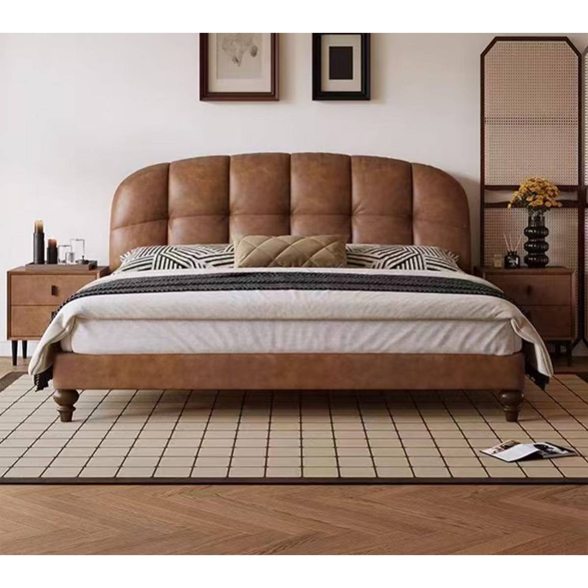 Front view of the bed with pillows and throw blanket