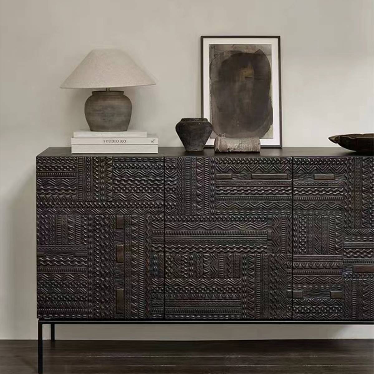 Close-up of the intricate geometric wood carving details