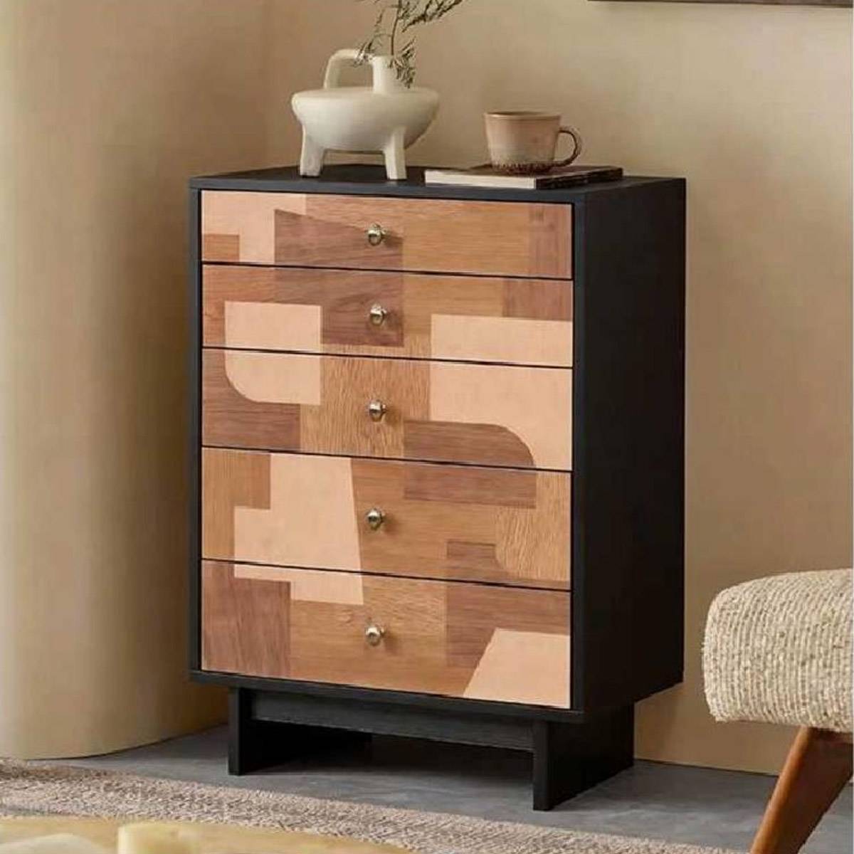 Side angle view of the chest of drawers showing depth and drawer details