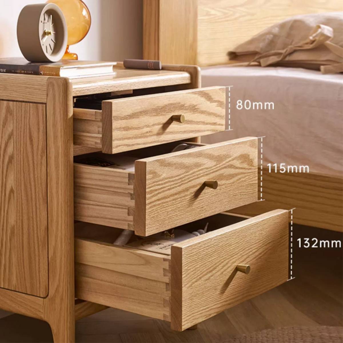 Close-up of the open drawers showing internal dimensions of 80mm, 115mm, and 132mm