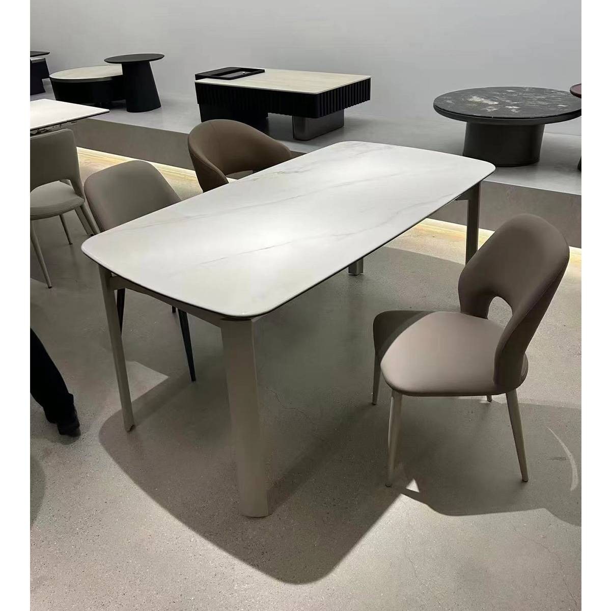 Angled view of dining table in showroom setting