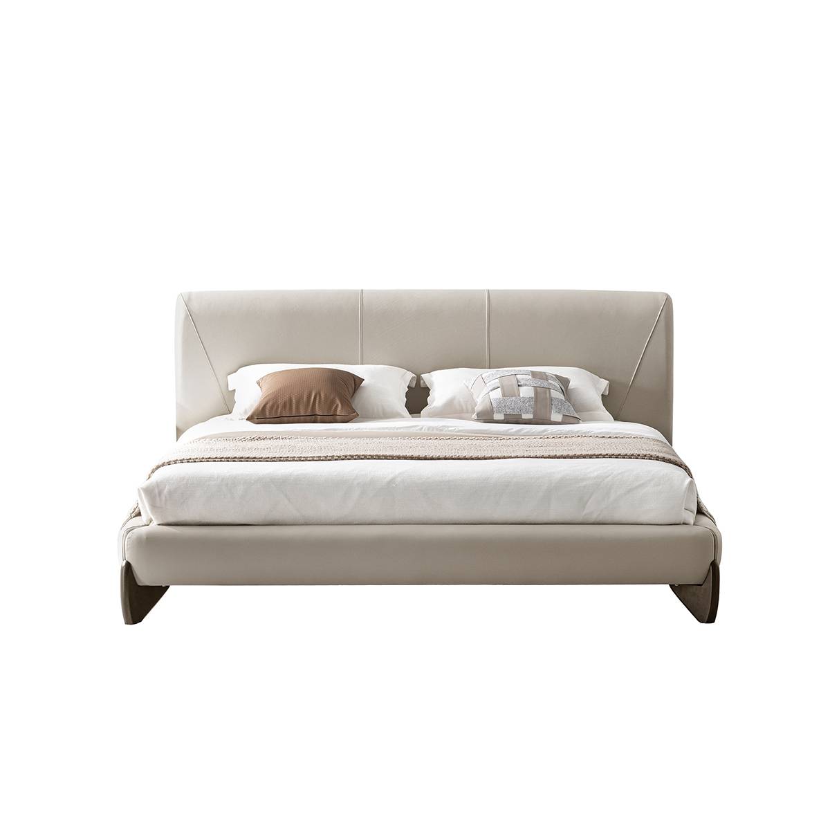 Front view of the beige leather bed against a white background