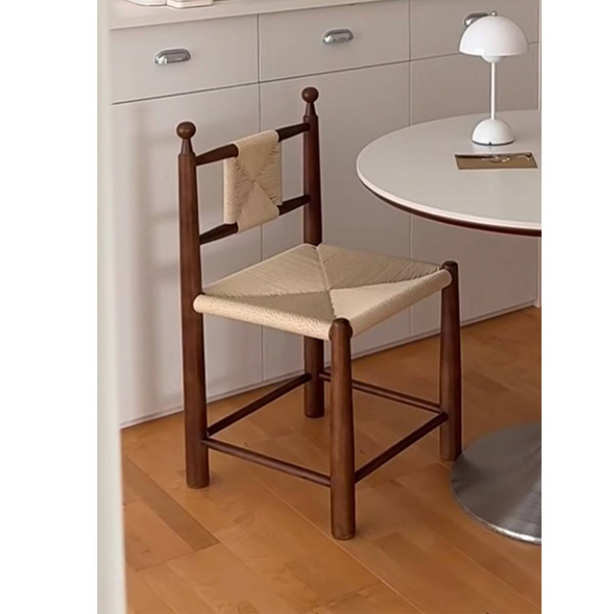 Front view of the dining chair in a home office setting