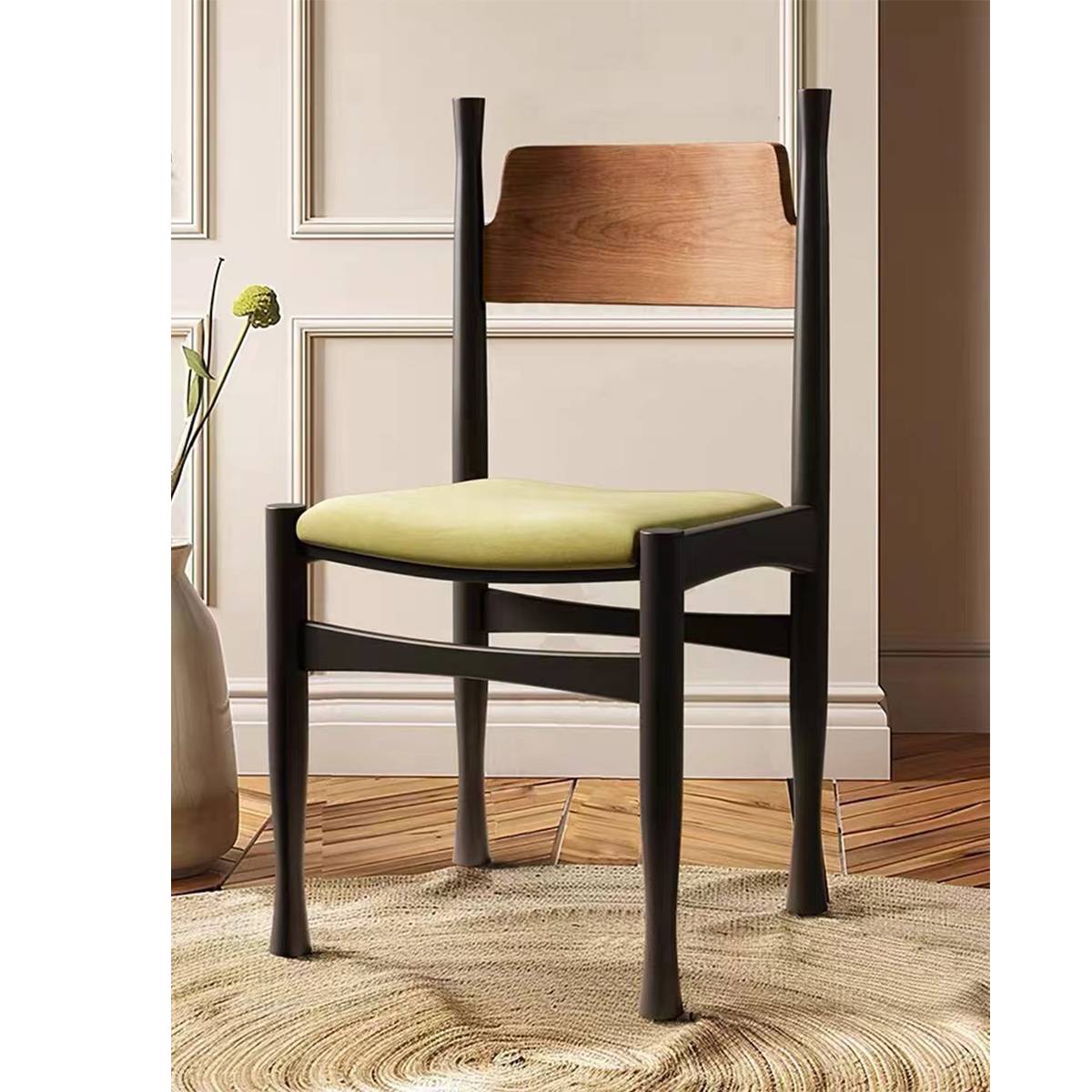 Dining chair placed in a room setting with a rug