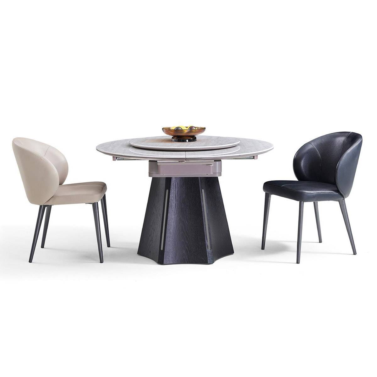 Studio shot of the dining table with beige and black chairs