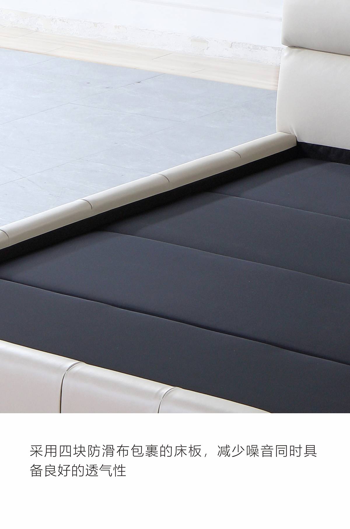 Close-up of the bed base showing the anti-slip fabric wrapped slats