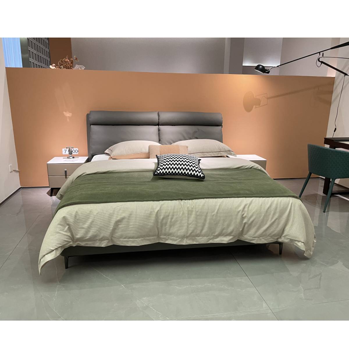 Front view of the bed with bedside table