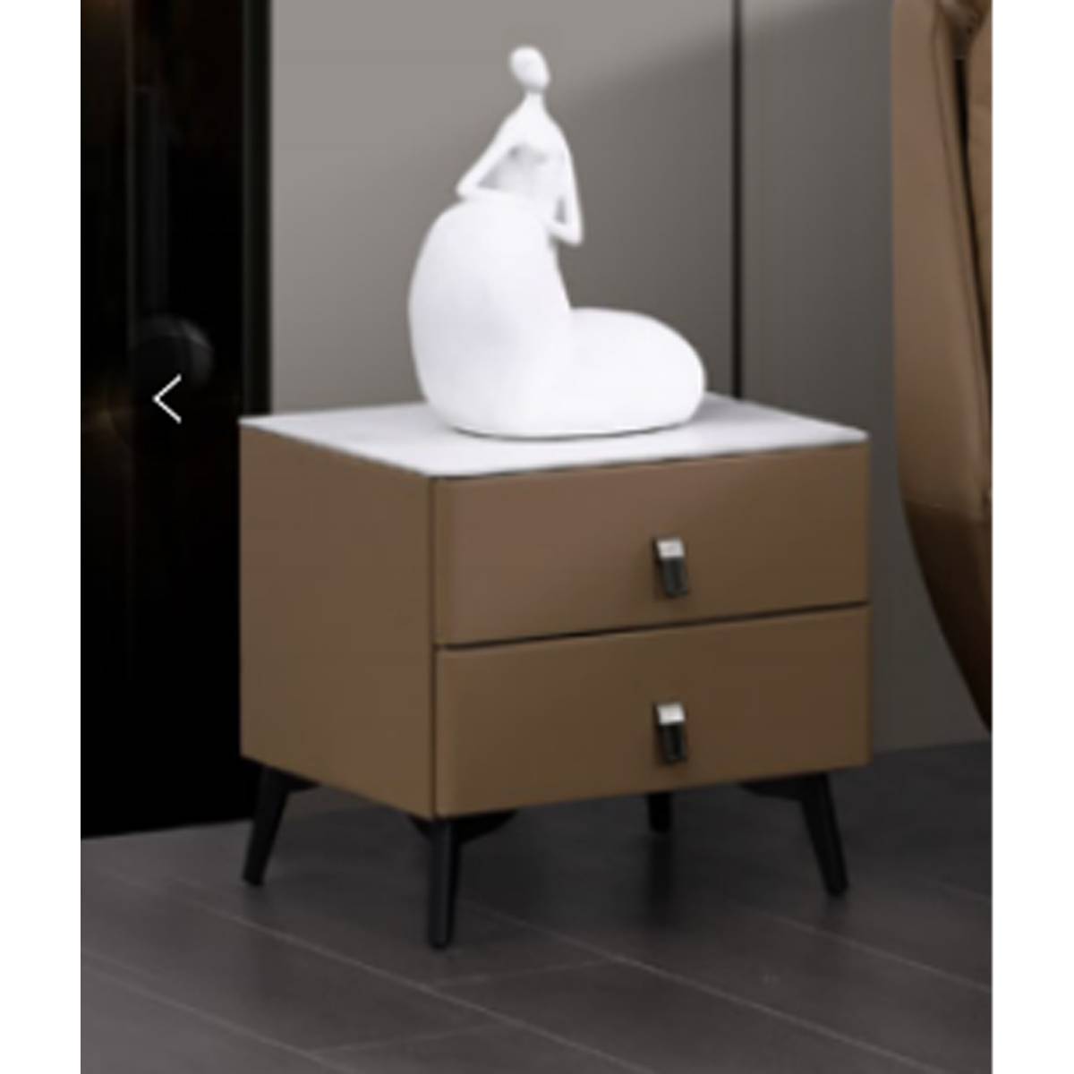 Brown leather bedside table in a bedroom setting