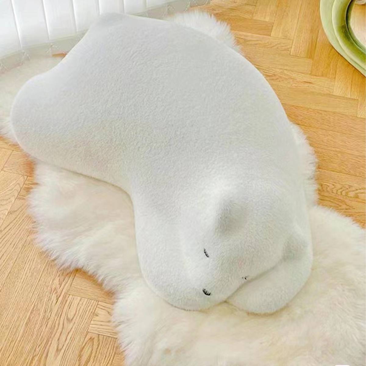 White bear-shaped floor stool on a rug