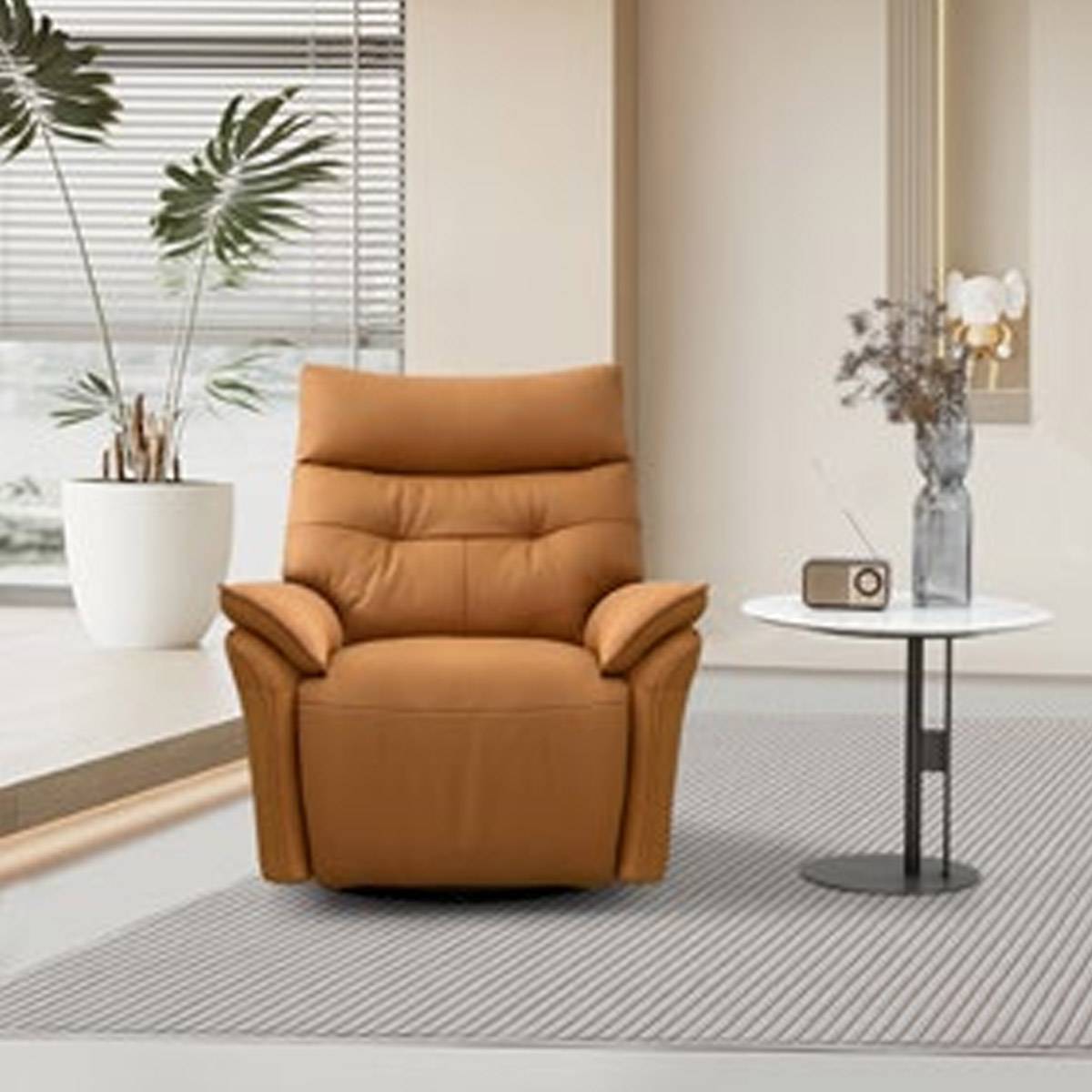 Front view of the tan leather recliner chair