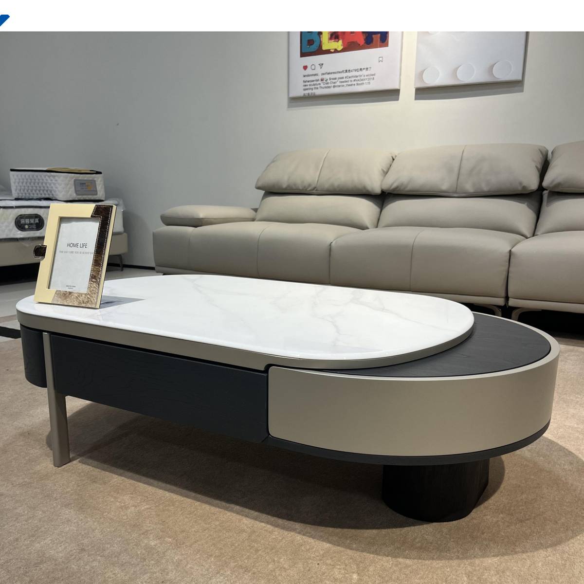 Coffee table in closed position showing white stone top and two-tone base