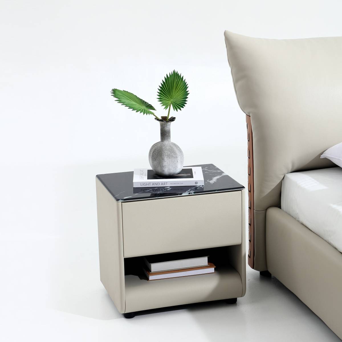 Close-up of the bed frame corner and bedding
