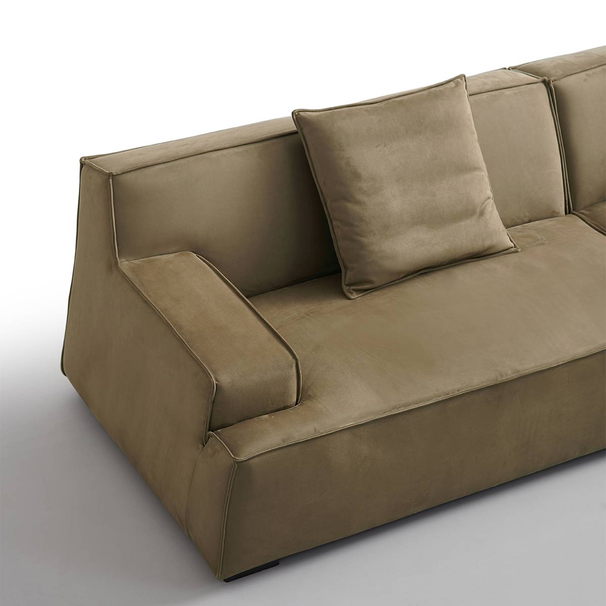 Close-up detail of the sofa armrest and side profile