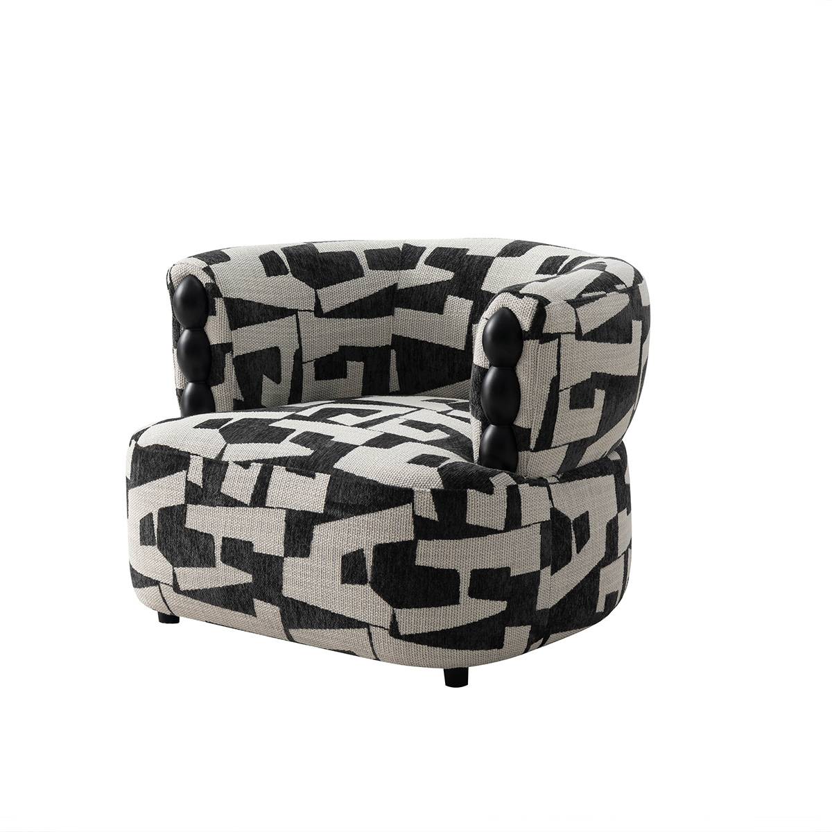 Lounge chair with black and white geometric pattern