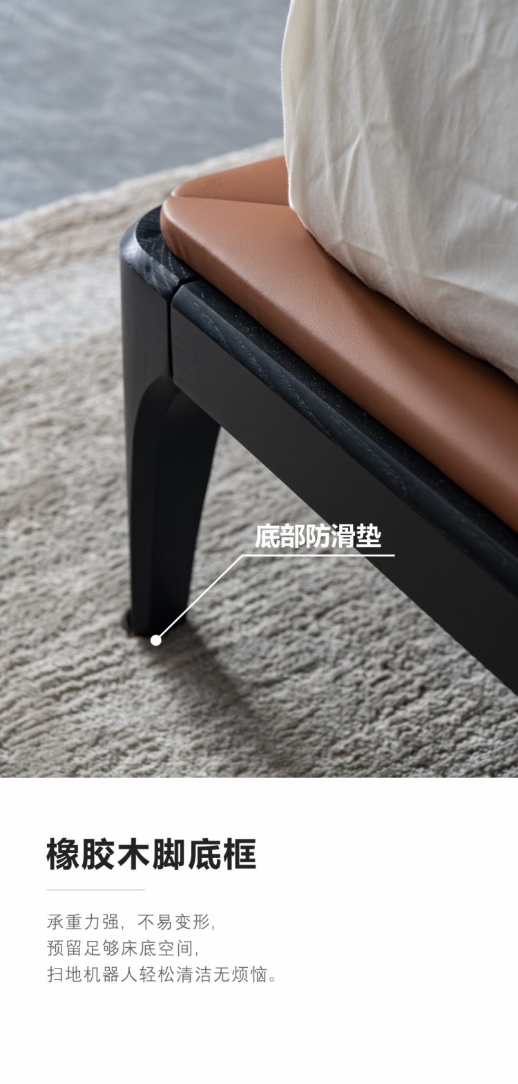 Close-up of the bed leg showing the anti-slip pad and rubber wood frame construction