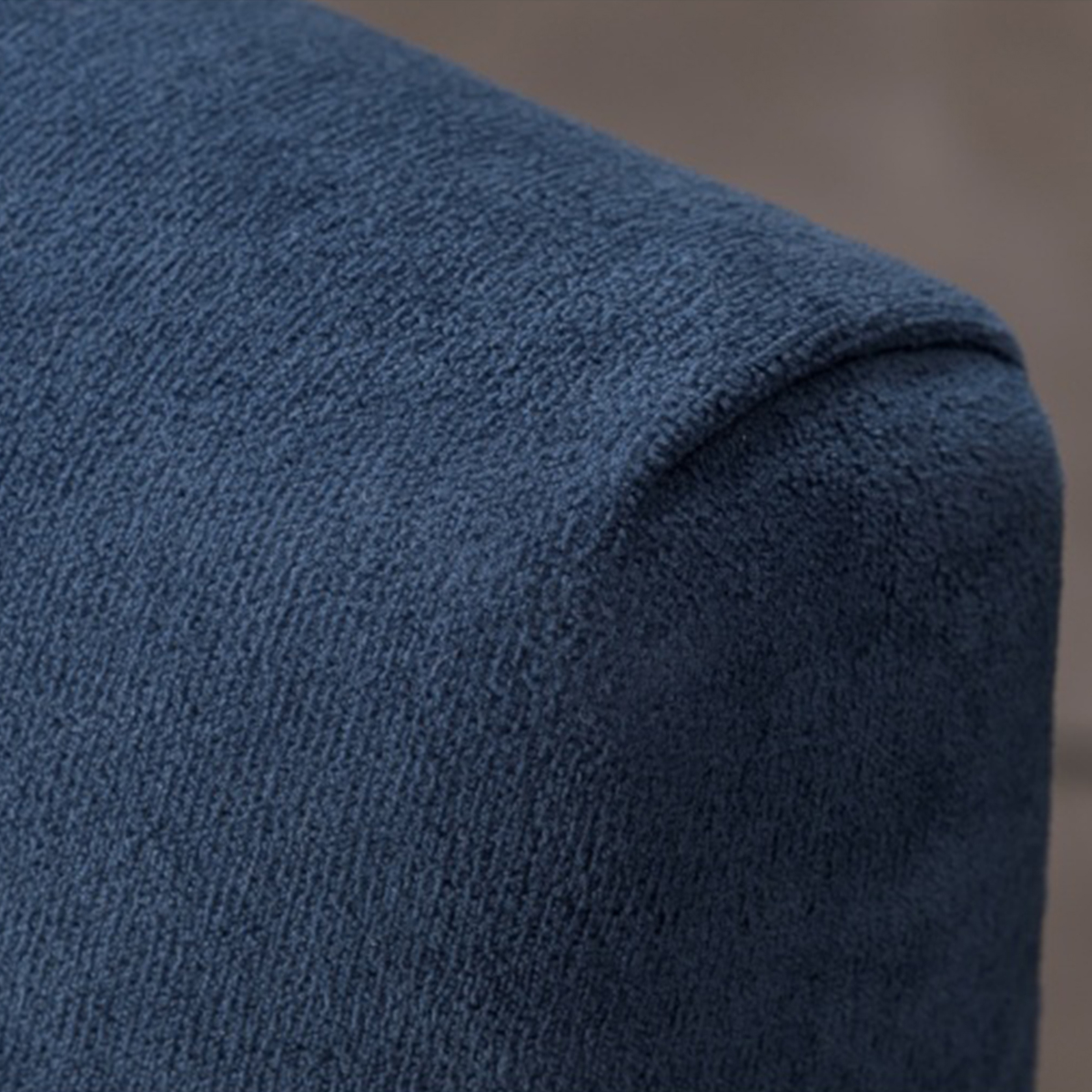 Close-up texture shot of the blue velvet fabric