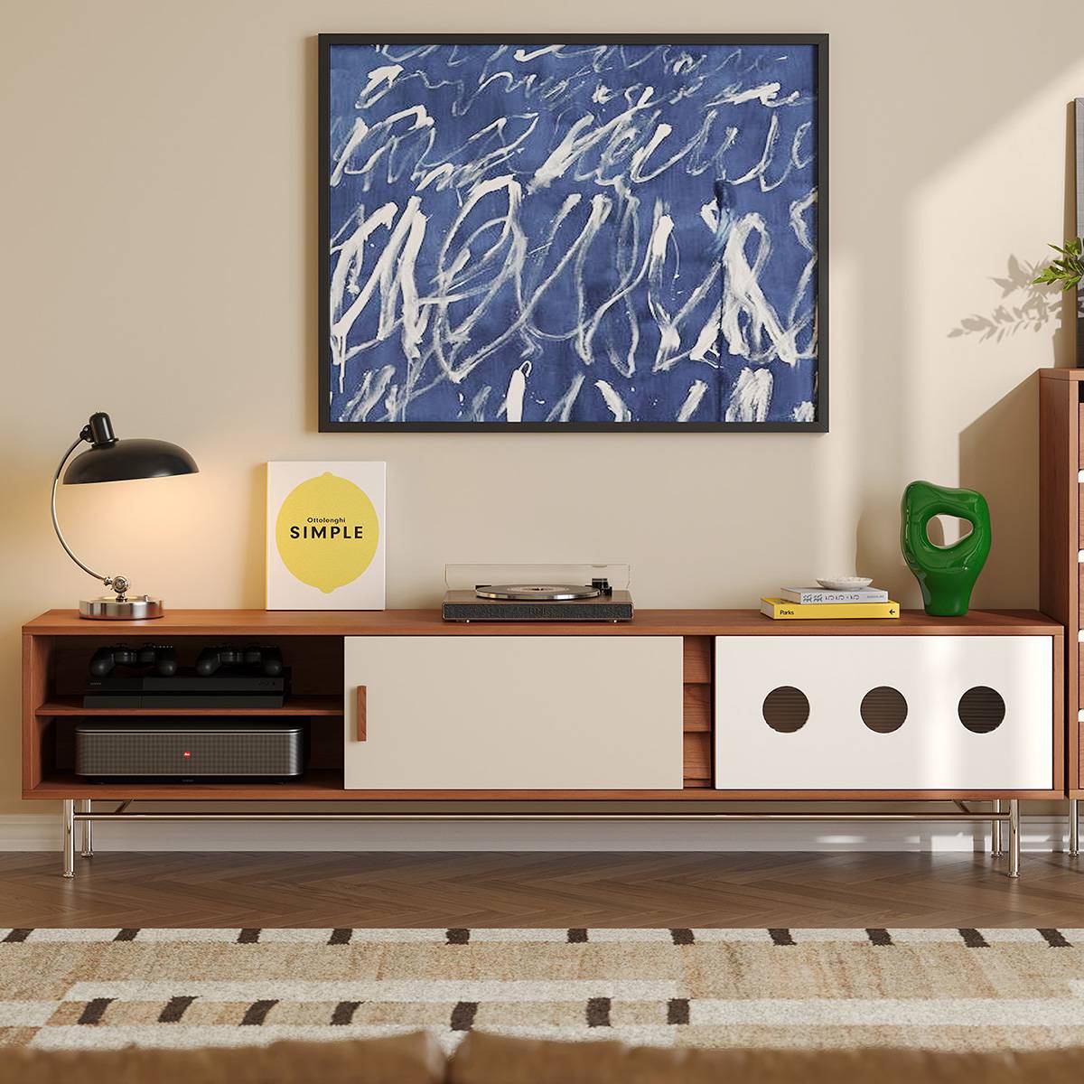 TV console with open shelving on the left side holding electronics