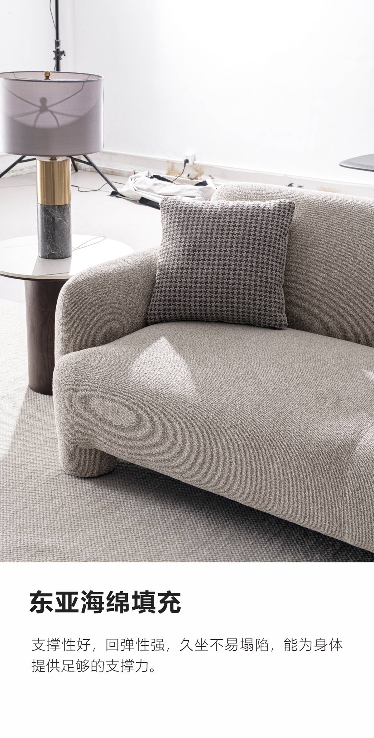 Close-up of the sofa seat and cushion highlighting the fabric texture