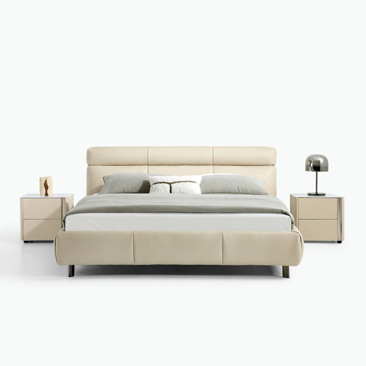 Front view of the beige leather soft bed showing the headboard and footboard details