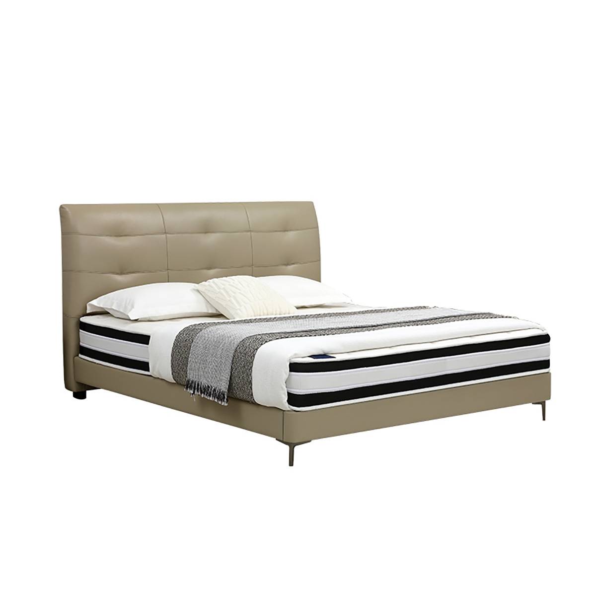 Full view of the beige tufted leather bed in a modern bedroom setting