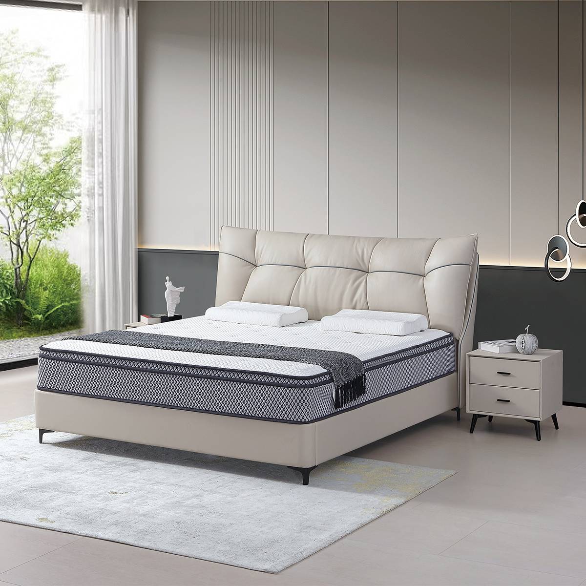 Side angle view of the bed in a modern bedroom setting with a rug and window
