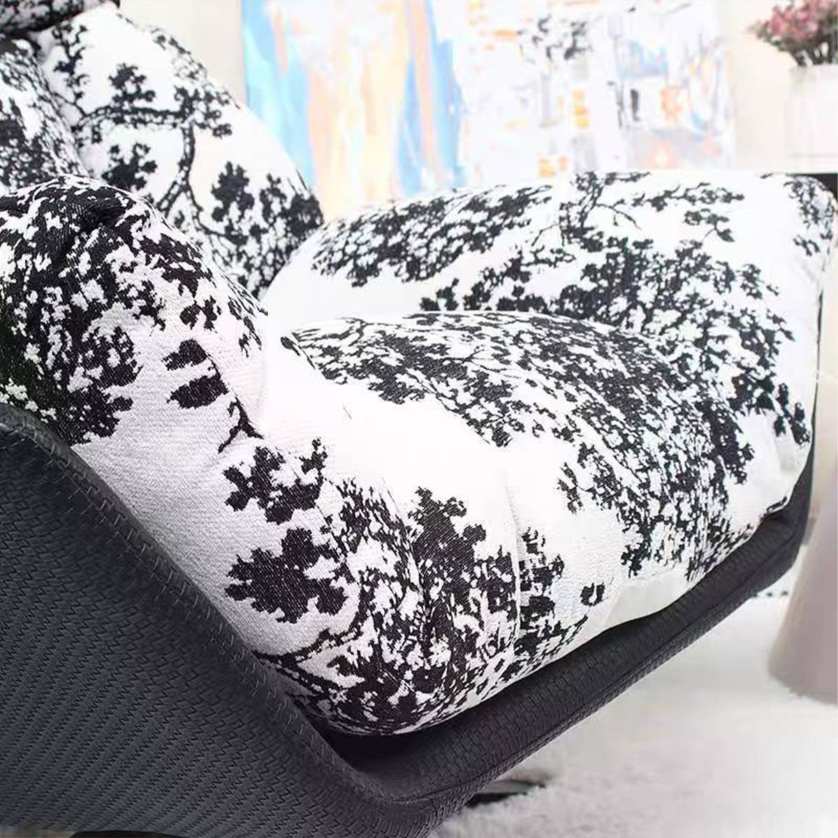 Close-up detail of the black and white floral fabric texture