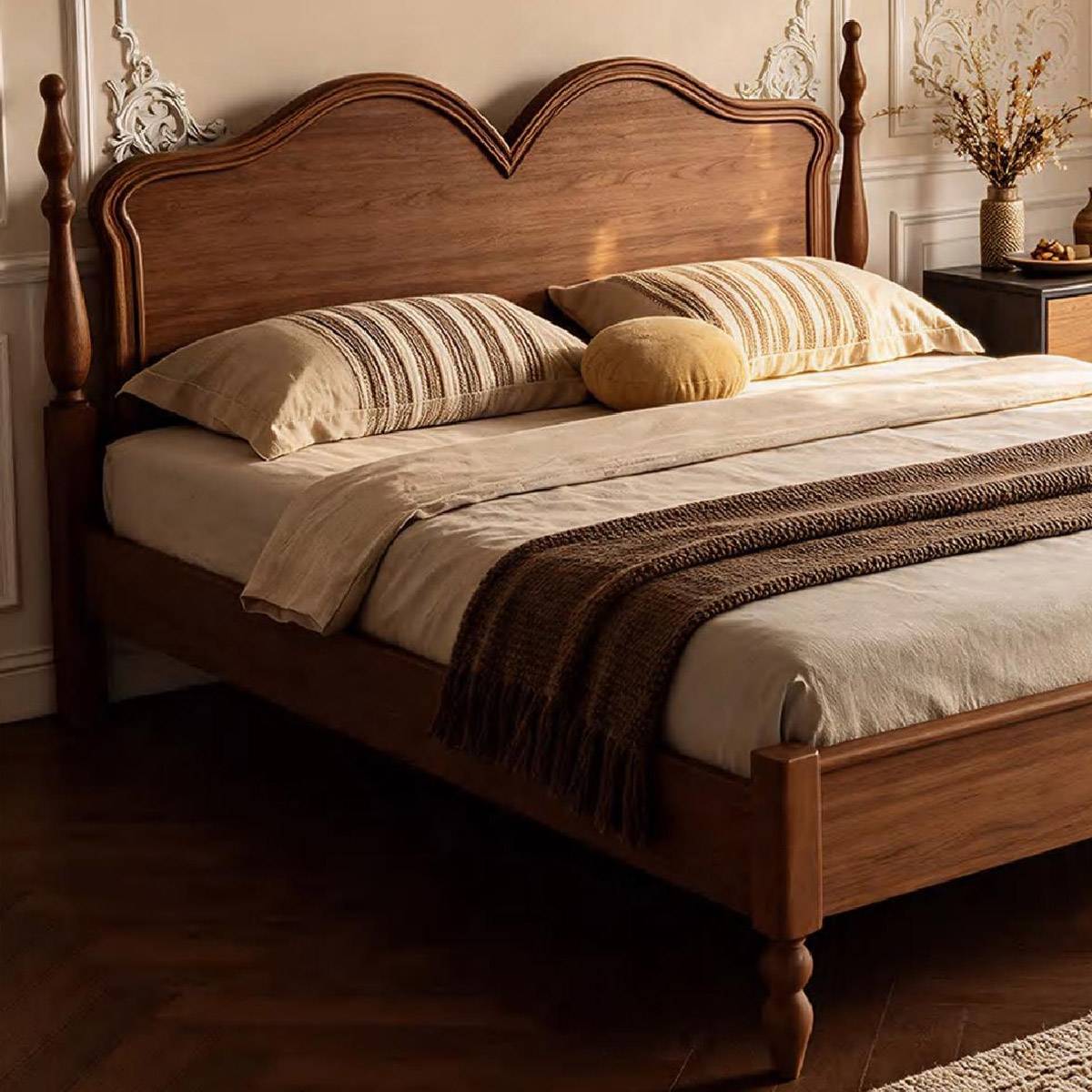 Close-up angle of the bed showing the bedding and headboard details