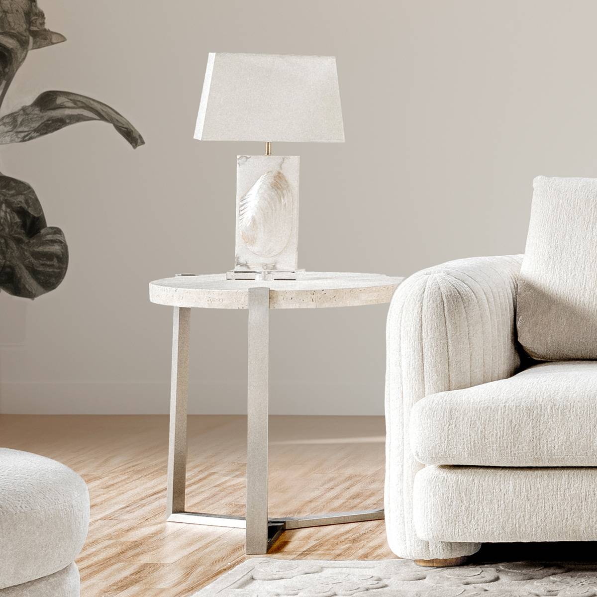 Laramie side table placed next to a sofa with a lamp on top