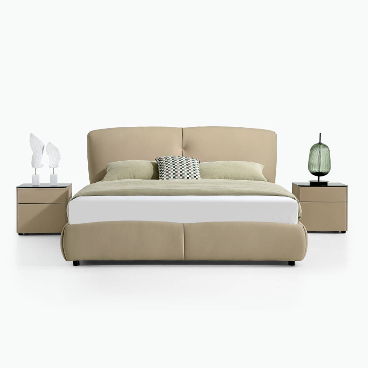 Front view of the beige leather bed showing the headboard and bedding arrangement