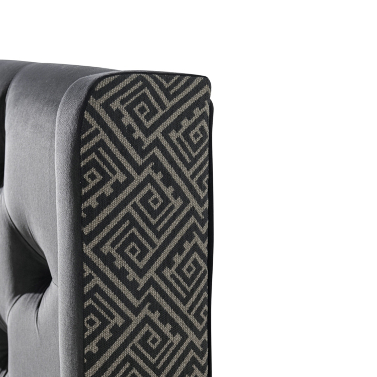 Close-up detail of the geometric patterned fabric on the headboard wing
