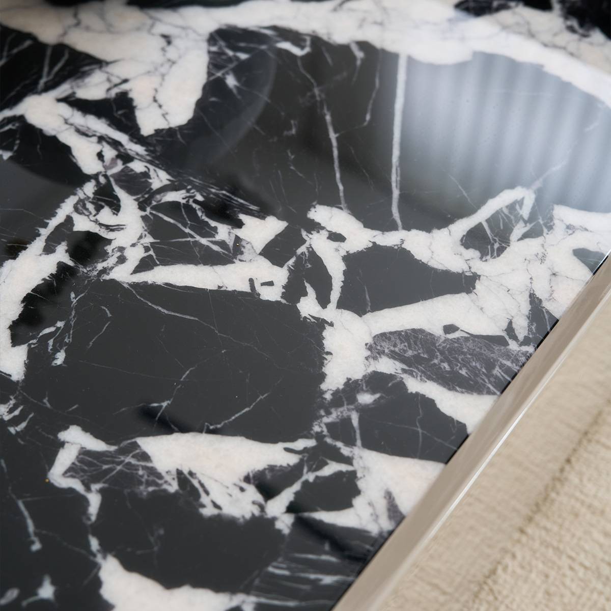 Detail shot of the Bulgari Black marble surface texture