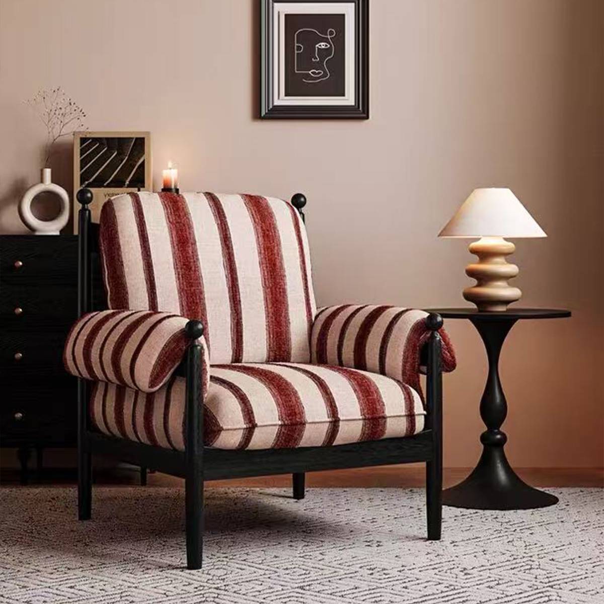 Side view of the striped lounge chair next to a side table