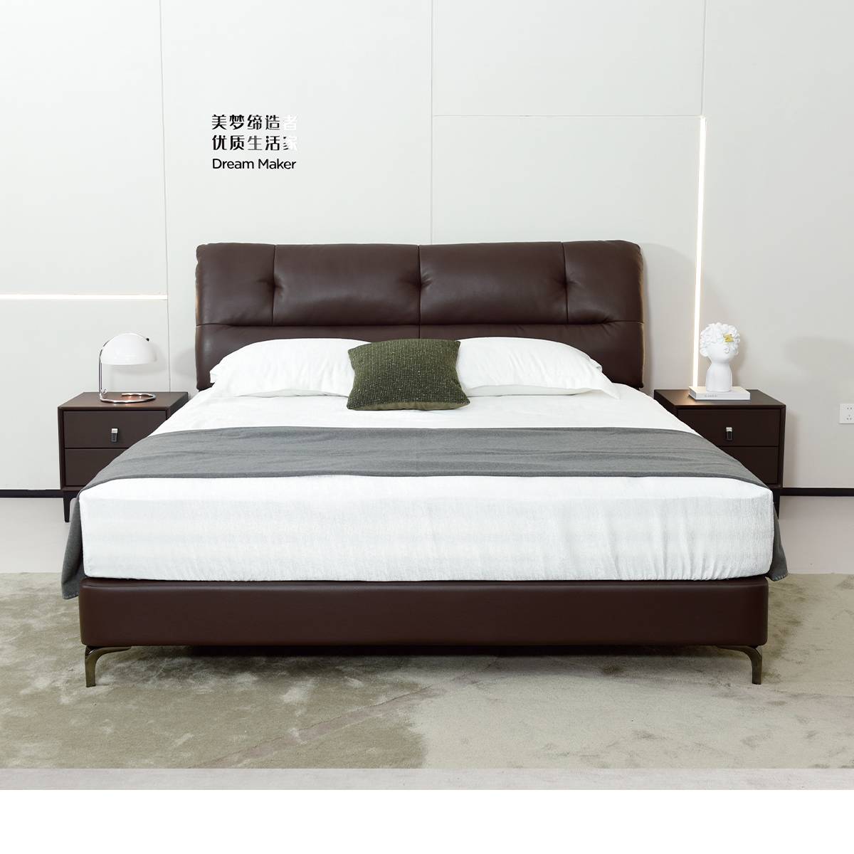 Front view of brown leather bed with nightstands