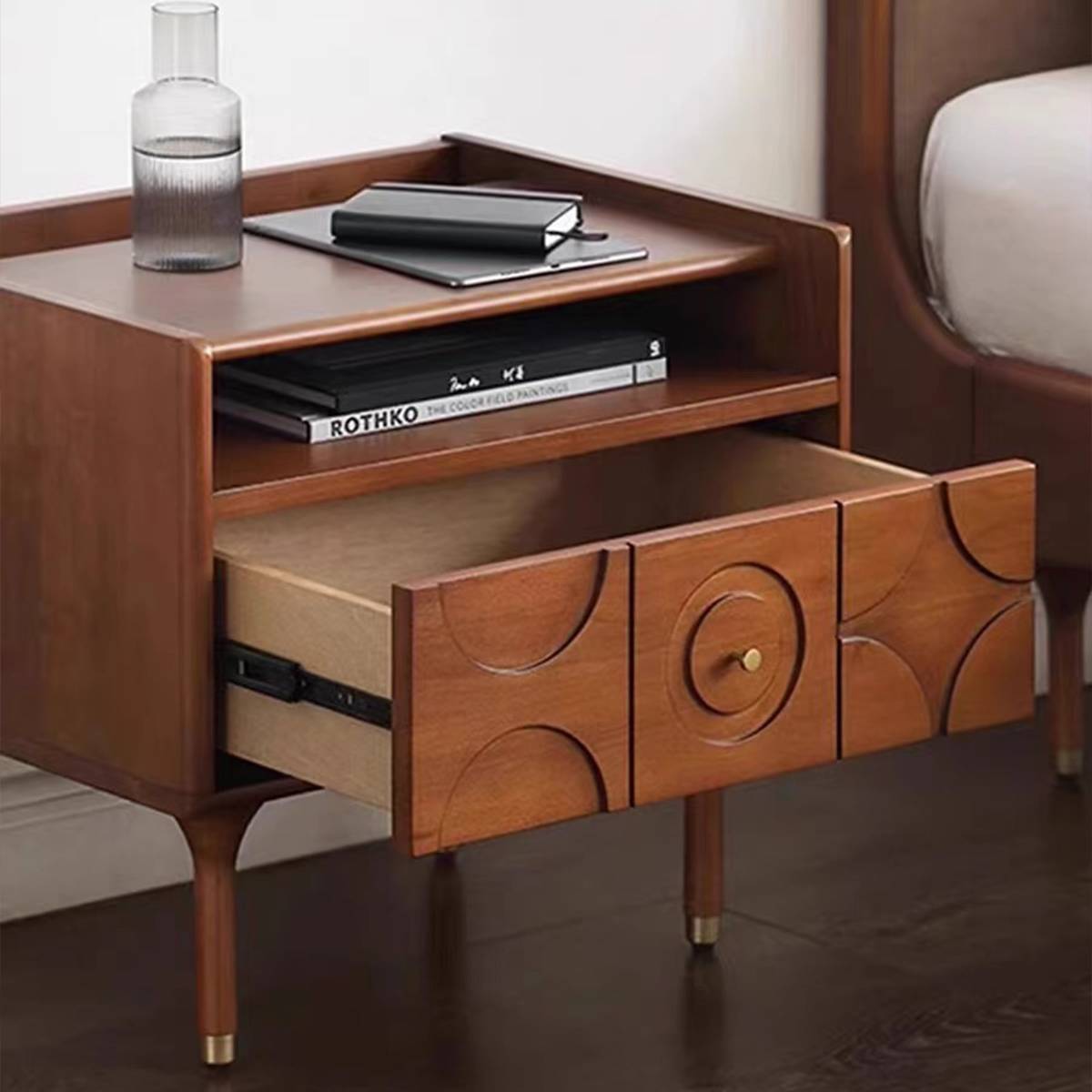 Side angle view of the wooden nightstand