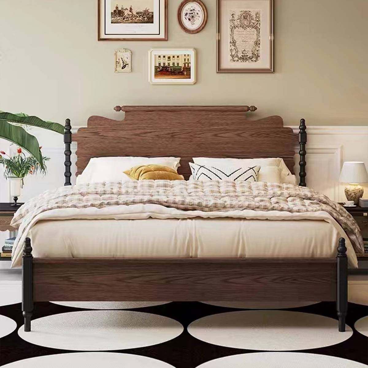 Angled view of the bed in a bedroom setting with window and rug