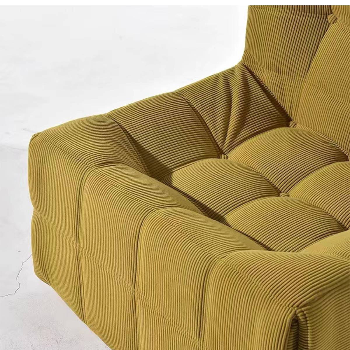 Close-up of mustard yellow chenille waffle grid chair