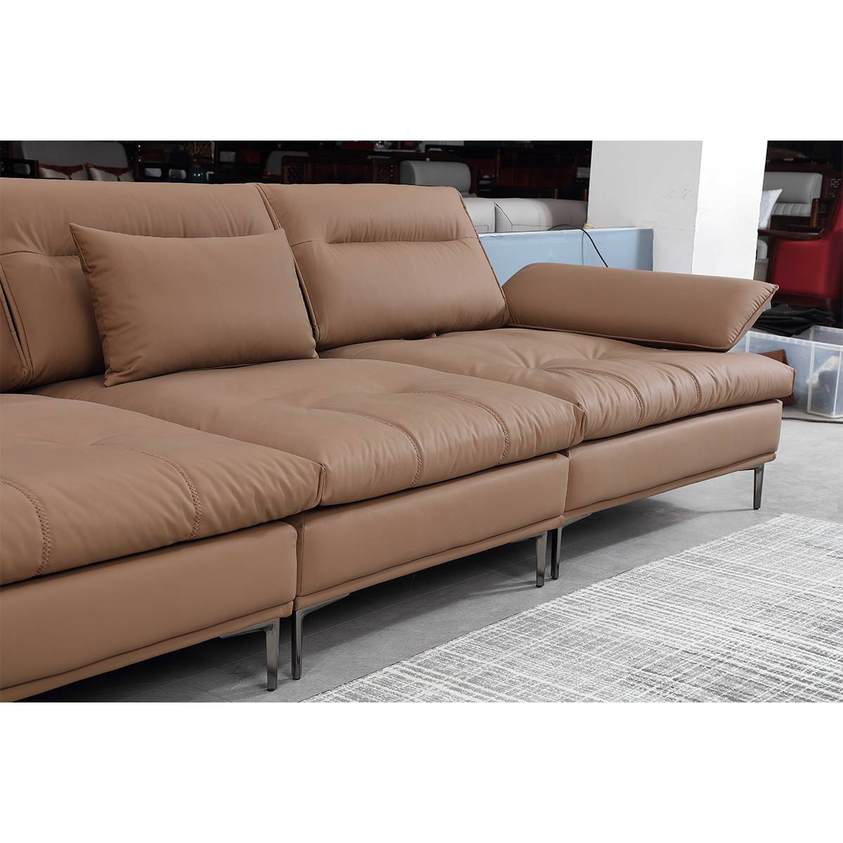 Close-up view of the sofa seat and armrest details