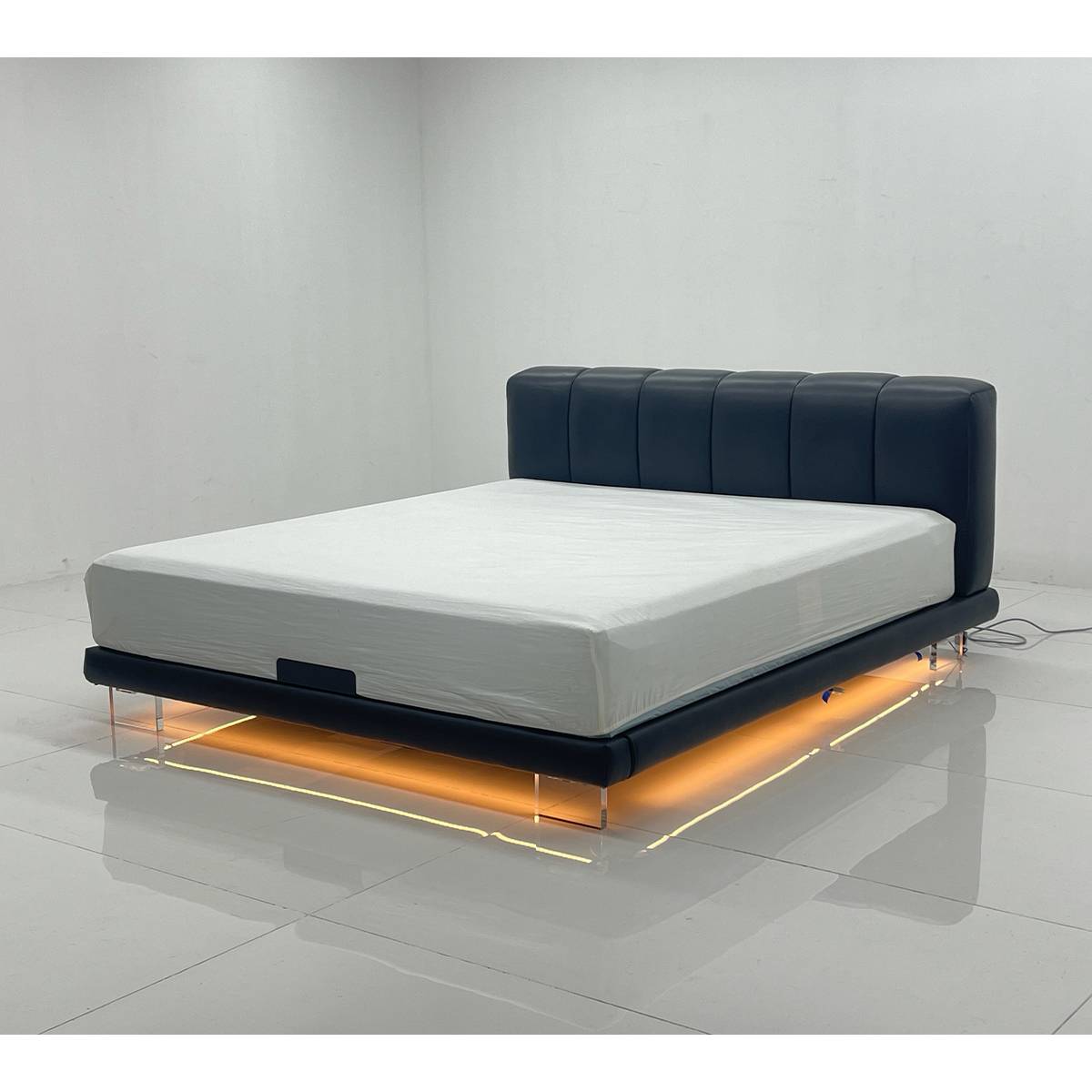 Side angle view of the floating bed showing the LED lighting underneath