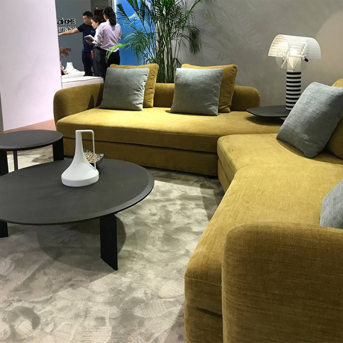 Close-up view of sofa cushions and coffee table