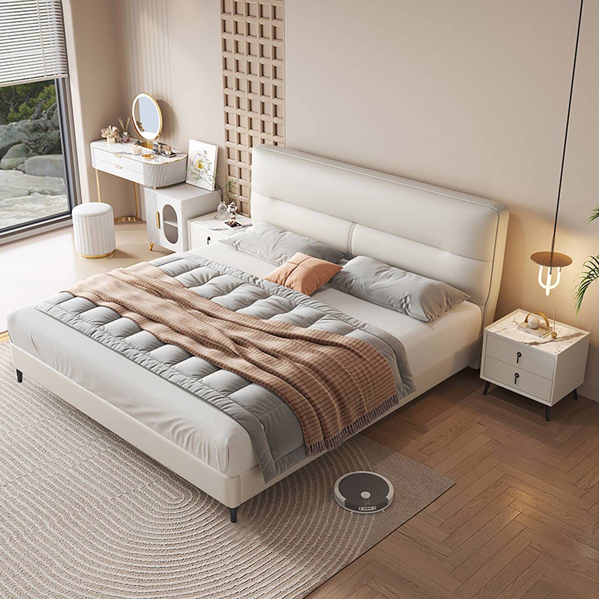 High-angle view of the white bed showing the bedding and room layout