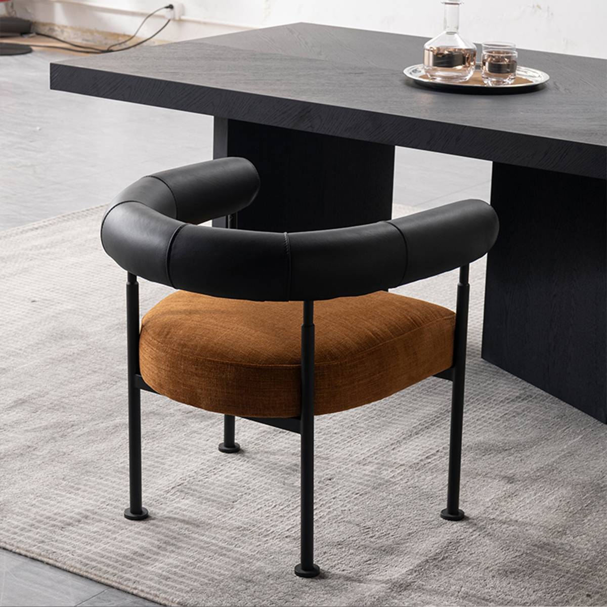 Lounge chair placed at a dining table setting