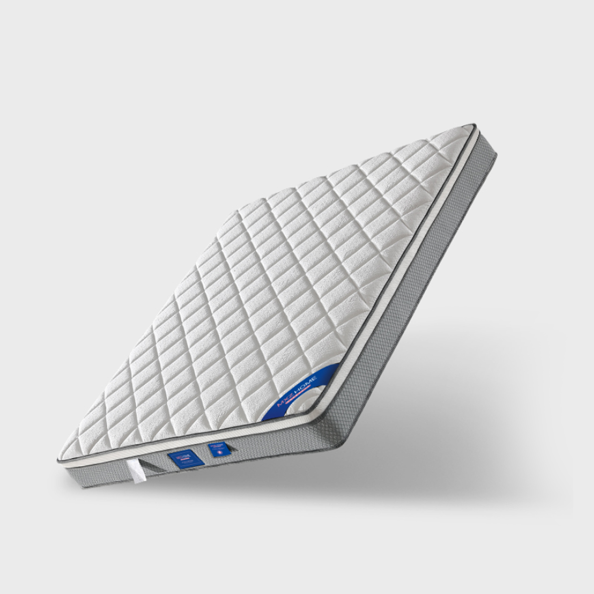 Angled view showing the thickness and side profile of the mattress
