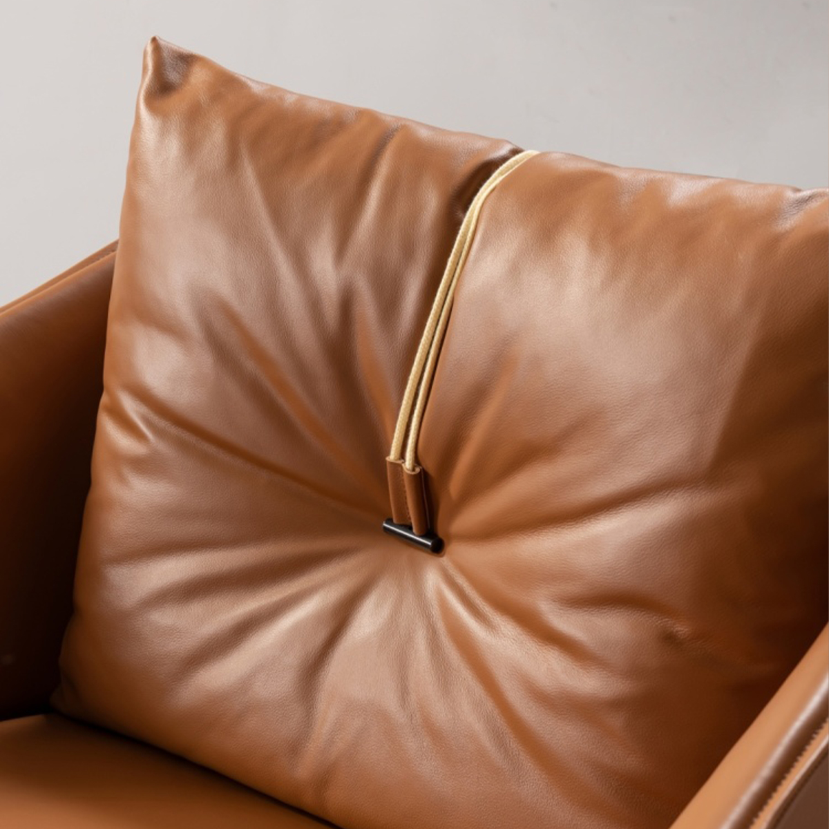 Close-up detail of the backrest cushion with drawstring design