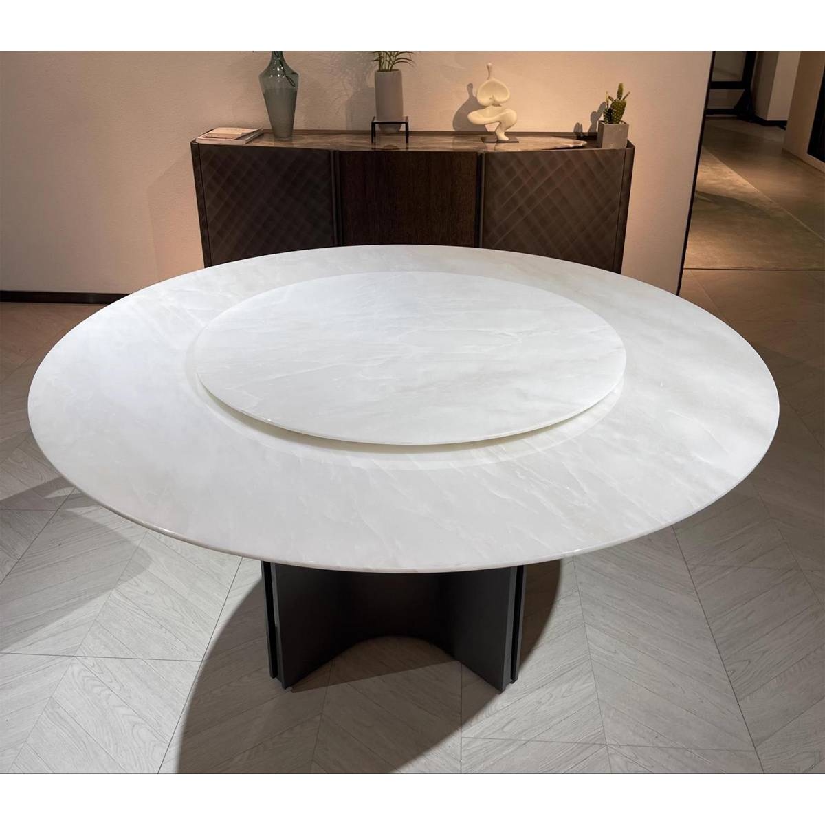 Close-up view of the Kali Ice Jade marble tabletop and rotating tray