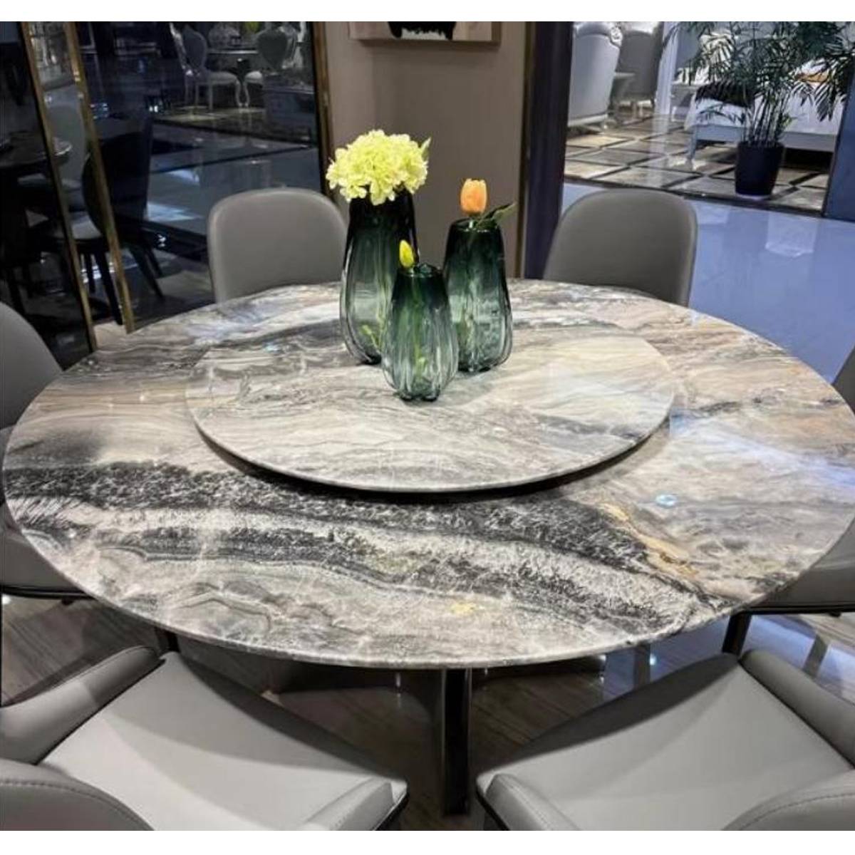 Top-down view of the dining table showing the marble pattern and the central rotating tray